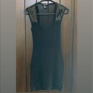 Black body con dress with sheer back and detailed shoulders